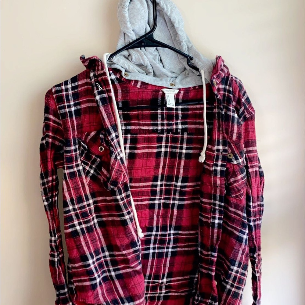Plaid, button up, long sleeve shirt with a hood.